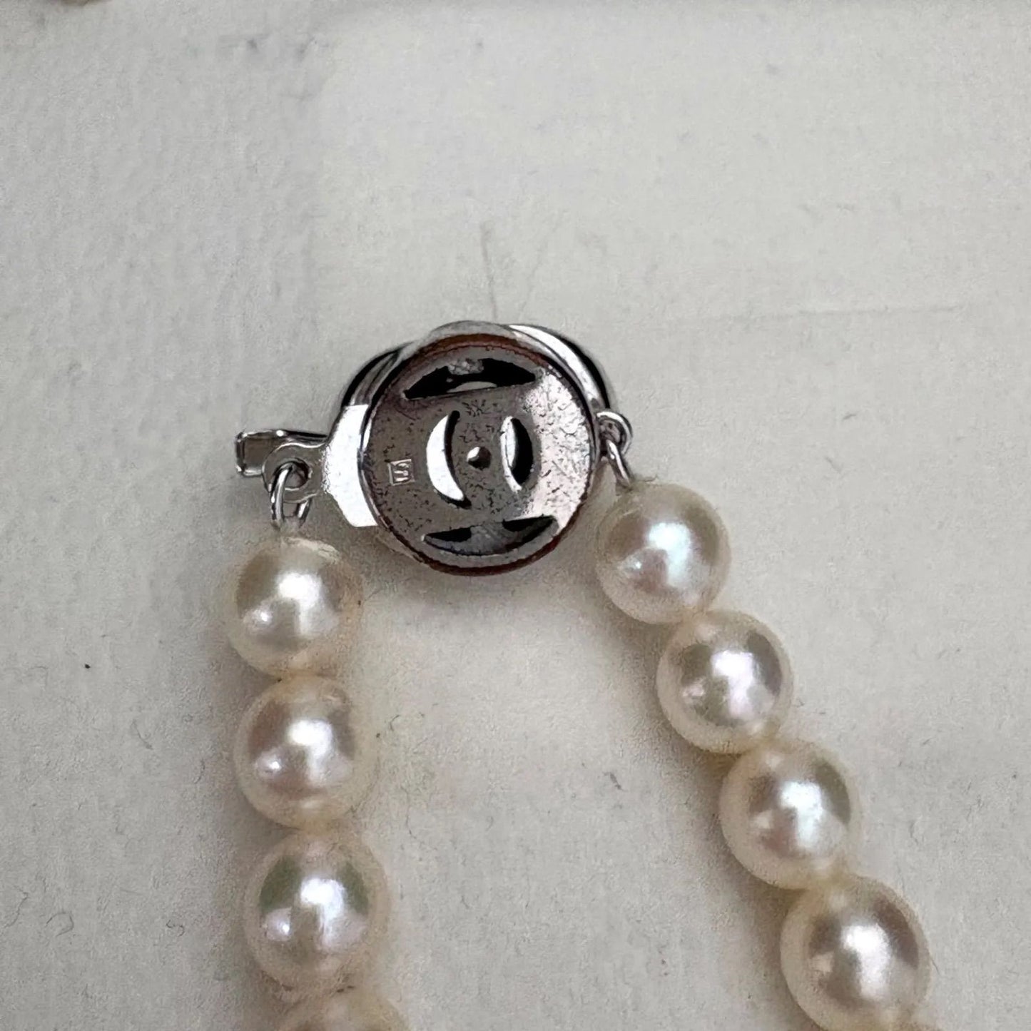 TASAKI Akoya pearl necklace featuring 6.5-7.0mm pearls and silver clasp on a 43cm strand