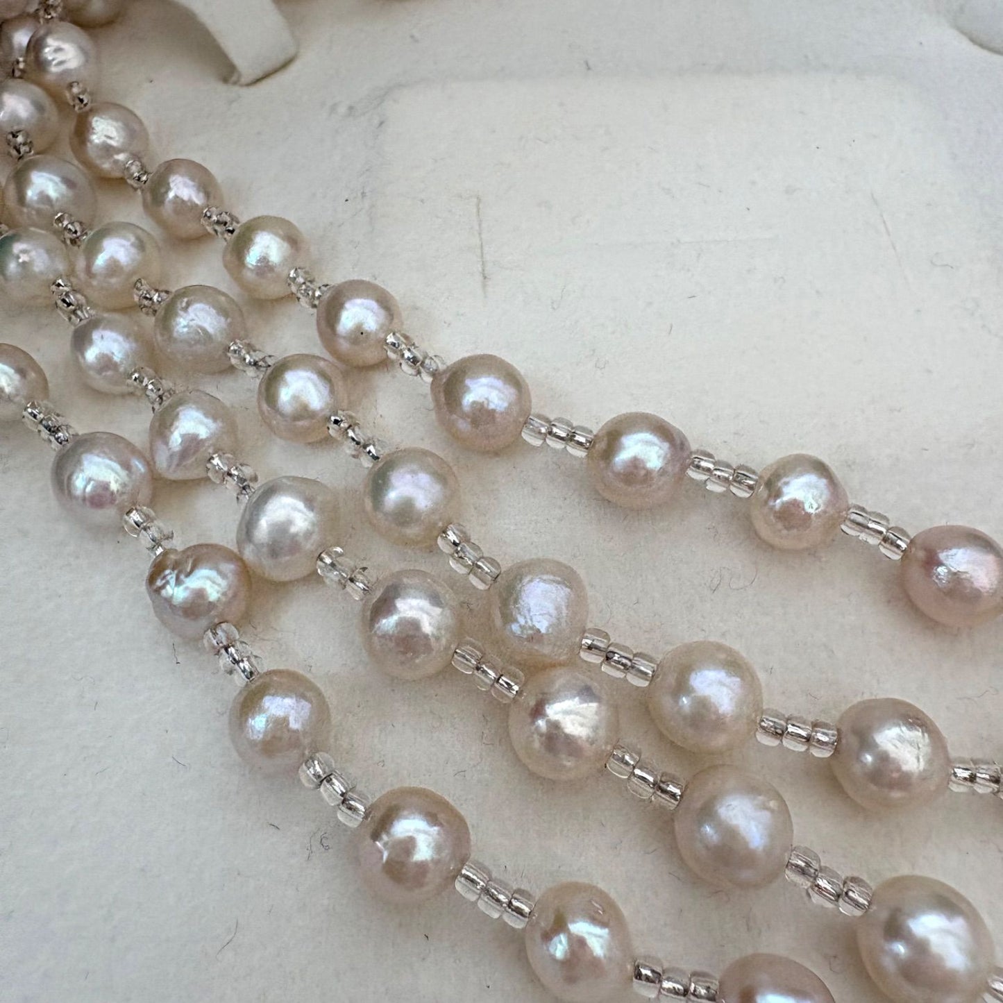 Long necklace featuring lustrous baroque Akoya pearls and crystal beads measuring about 120cm
