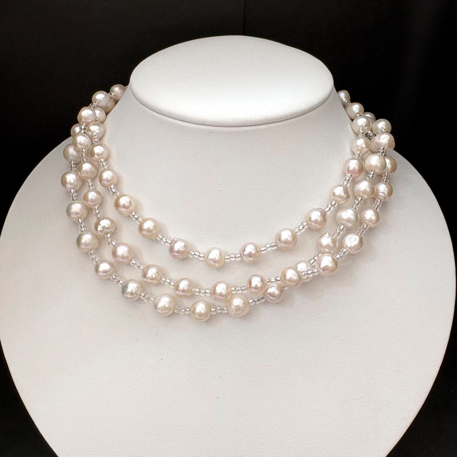 Long necklace featuring lustrous baroque Akoya pearls and crystal beads measuring about 120cm