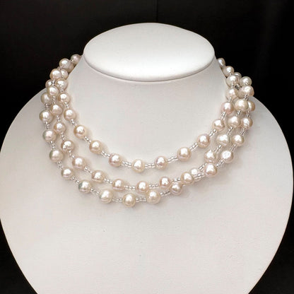 Long necklace featuring lustrous baroque Akoya pearls and crystal beads measuring about 120cm