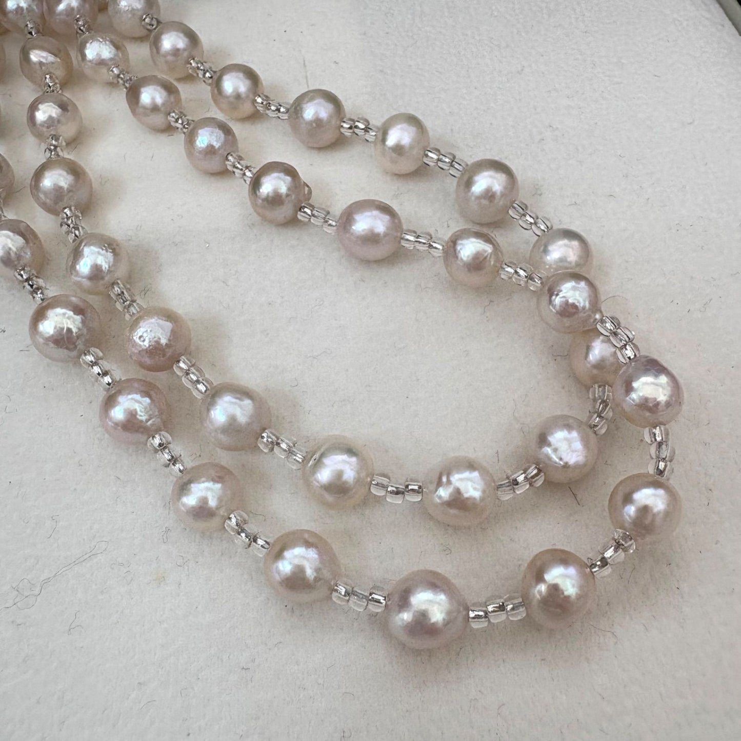 Long necklace featuring lustrous baroque Akoya pearls and crystal beads measuring about 120cm