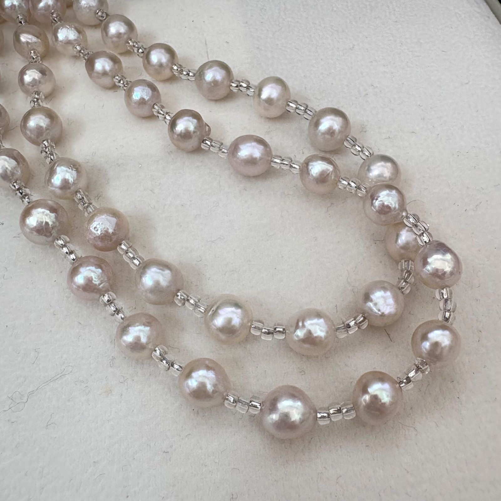 Long necklace featuring lustrous baroque Akoya pearls and crystal beads measuring about 120cm
