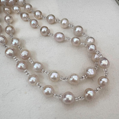 Long necklace featuring lustrous baroque Akoya pearls and crystal beads measuring about 120cm