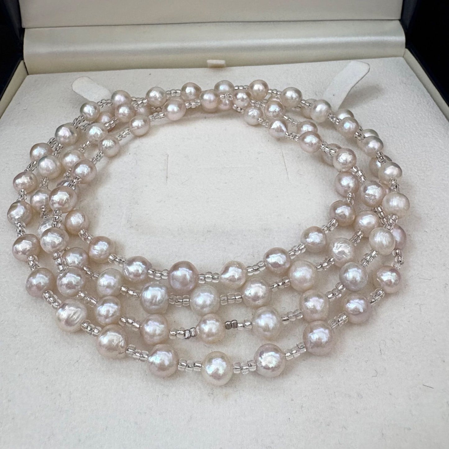 Long necklace featuring lustrous baroque Akoya pearls and crystal beads measuring about 120cm