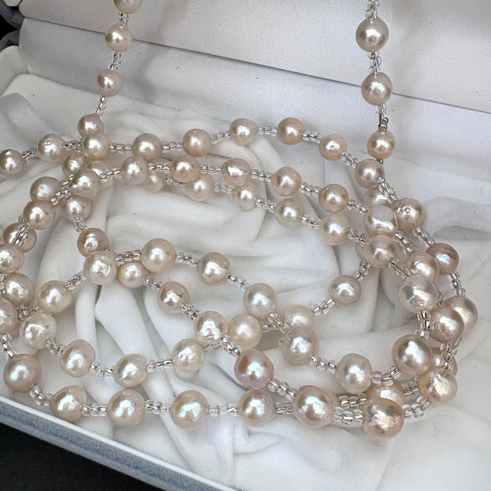 Long necklace featuring lustrous baroque Akoya pearls and crystal beads measuring about 120cm