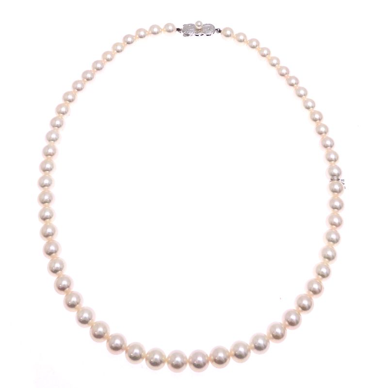 Mikimoto pearl necklace with 7 to 7.5 mm pearls and 43 cm length displayed on a white background