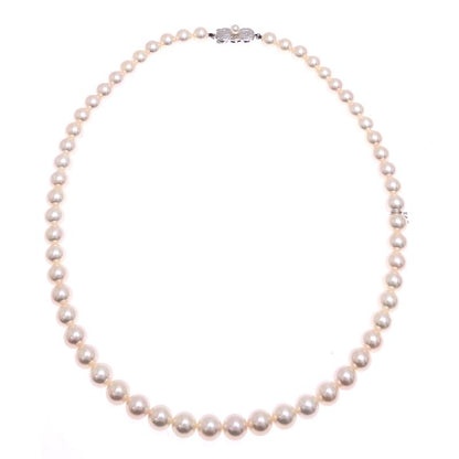 Mikimoto pearl necklace with 7 to 7.5 mm pearls and 43 cm length displayed on a white background