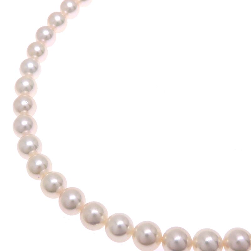 Mikimoto pearl necklace with 7 to 7.5 mm pearls and 43 cm length displayed on a white background
