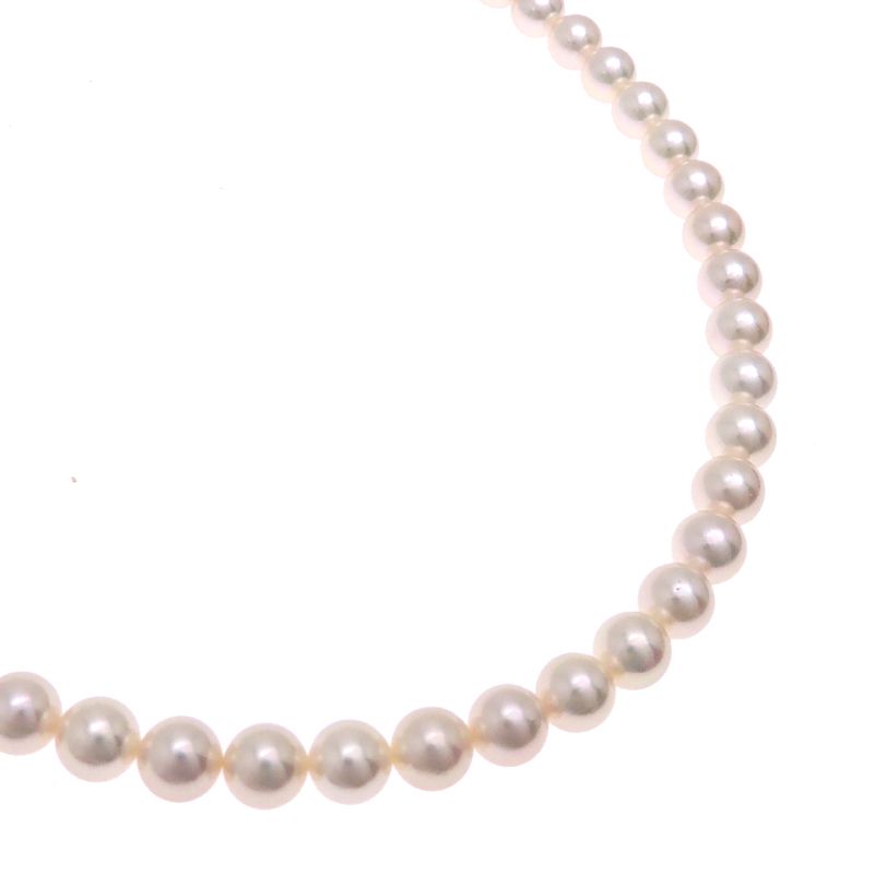 Mikimoto pearl necklace with 7 to 7.5 mm pearls and 43 cm length displayed on a white background