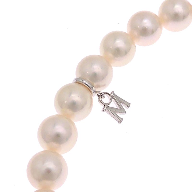 Mikimoto pearl necklace with 7 to 7.5 mm pearls and 43 cm length displayed on a white background