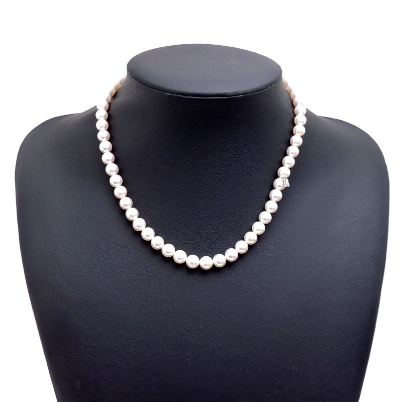 Mikimoto pearl necklace with 7 to 7.5 mm pearls and 43 cm length displayed on a white background