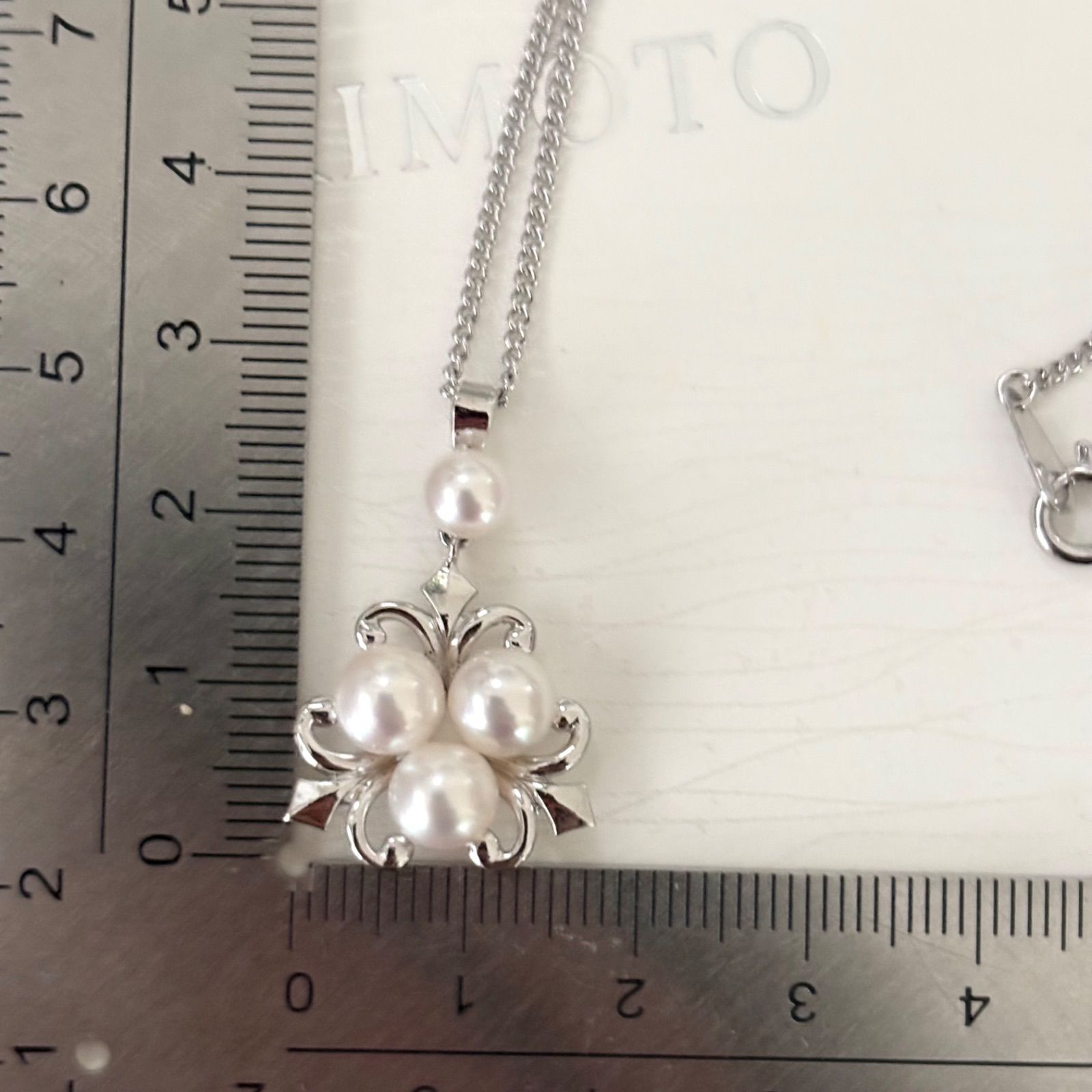 370 Mikimoto silver necklace with round pearls and 42cm length on a white background