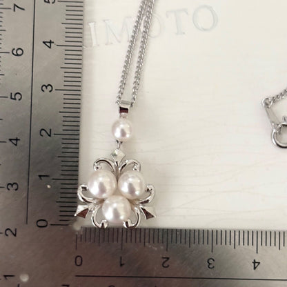 370 Mikimoto silver necklace with round pearls and 42cm length on a white background