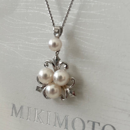 370 Mikimoto silver necklace with round pearls and 42cm length on a white background