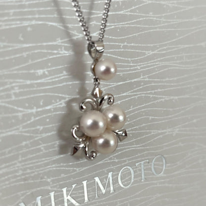 370 Mikimoto silver necklace with round pearls and 42cm length on a white background
