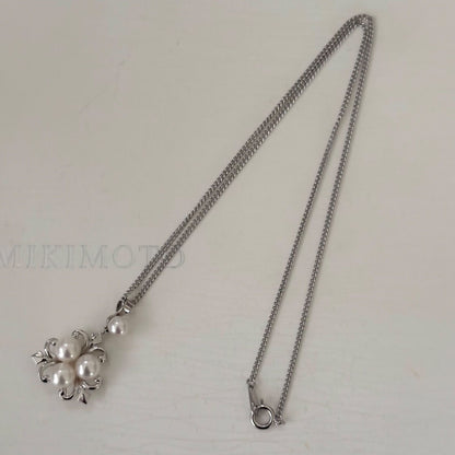 370 Mikimoto silver necklace with round pearls and 42cm length on a white background
