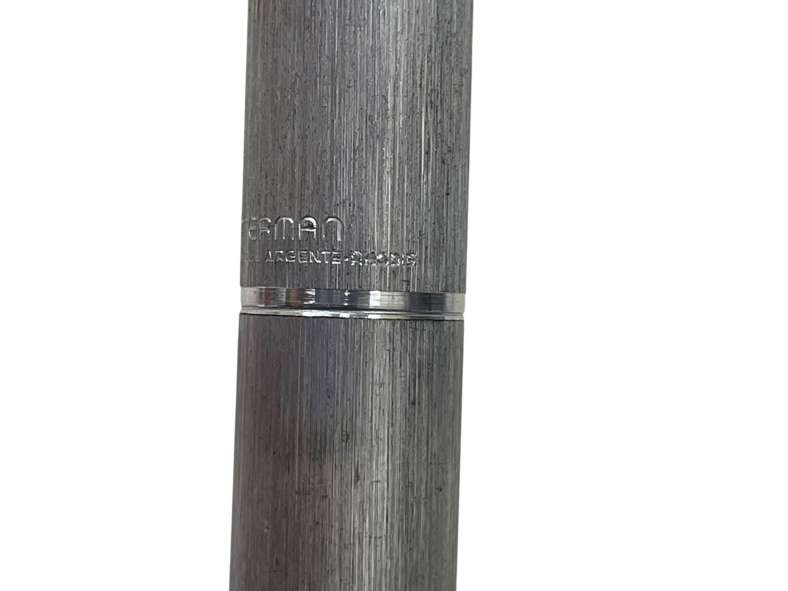 Waterman 18K 750 Mark French silver pen nib, 13.5 cm long, showing signs of wear and ink depletion