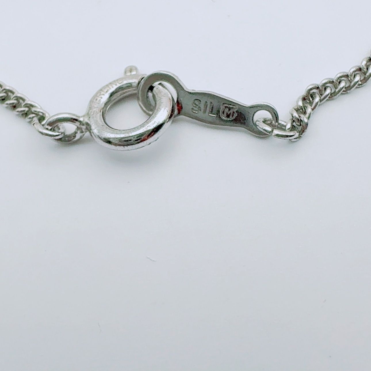 Mikimoto necklace with a 4.9mm baby pearl pendant and 40.5cm chain in silver tone