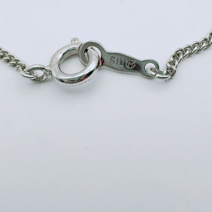 Mikimoto necklace with a 4.9mm baby pearl pendant and 40.5cm chain in silver tone