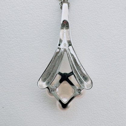 Mikimoto necklace with a 4.9mm baby pearl pendant and 40.5cm chain in silver tone