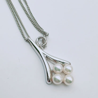 Mikimoto necklace with a 4.9mm baby pearl pendant and 40.5cm chain in silver tone