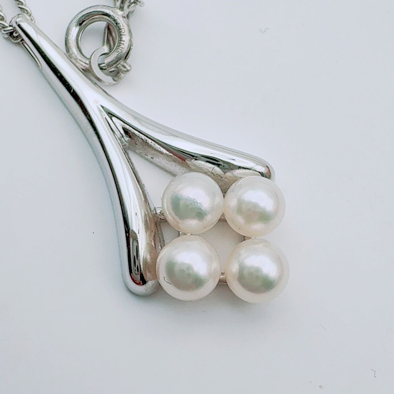 Mikimoto necklace with a 4.9mm baby pearl pendant and 40.5cm chain in silver tone