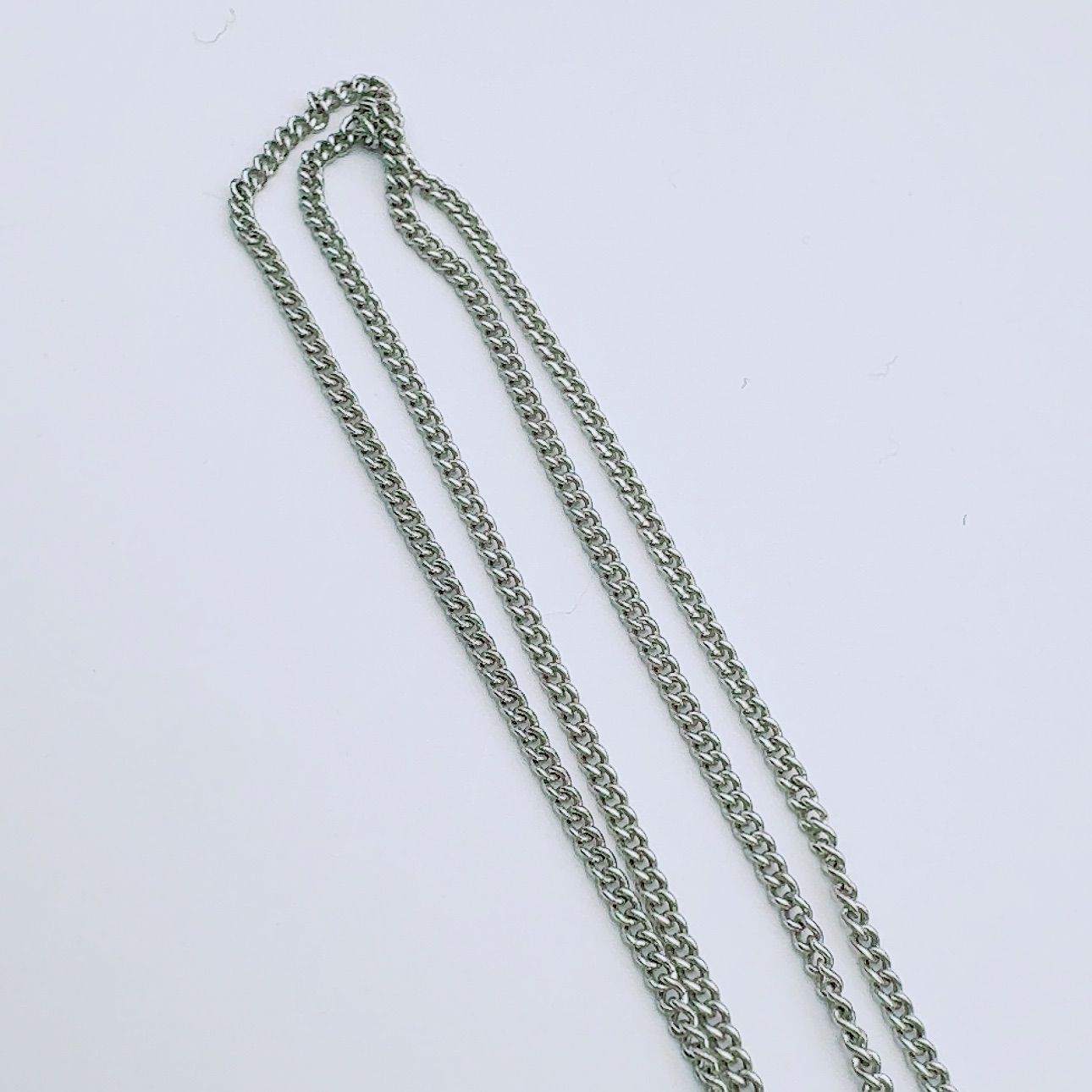 Mikimoto necklace with a 4.9mm baby pearl pendant and 40.5cm chain in silver tone