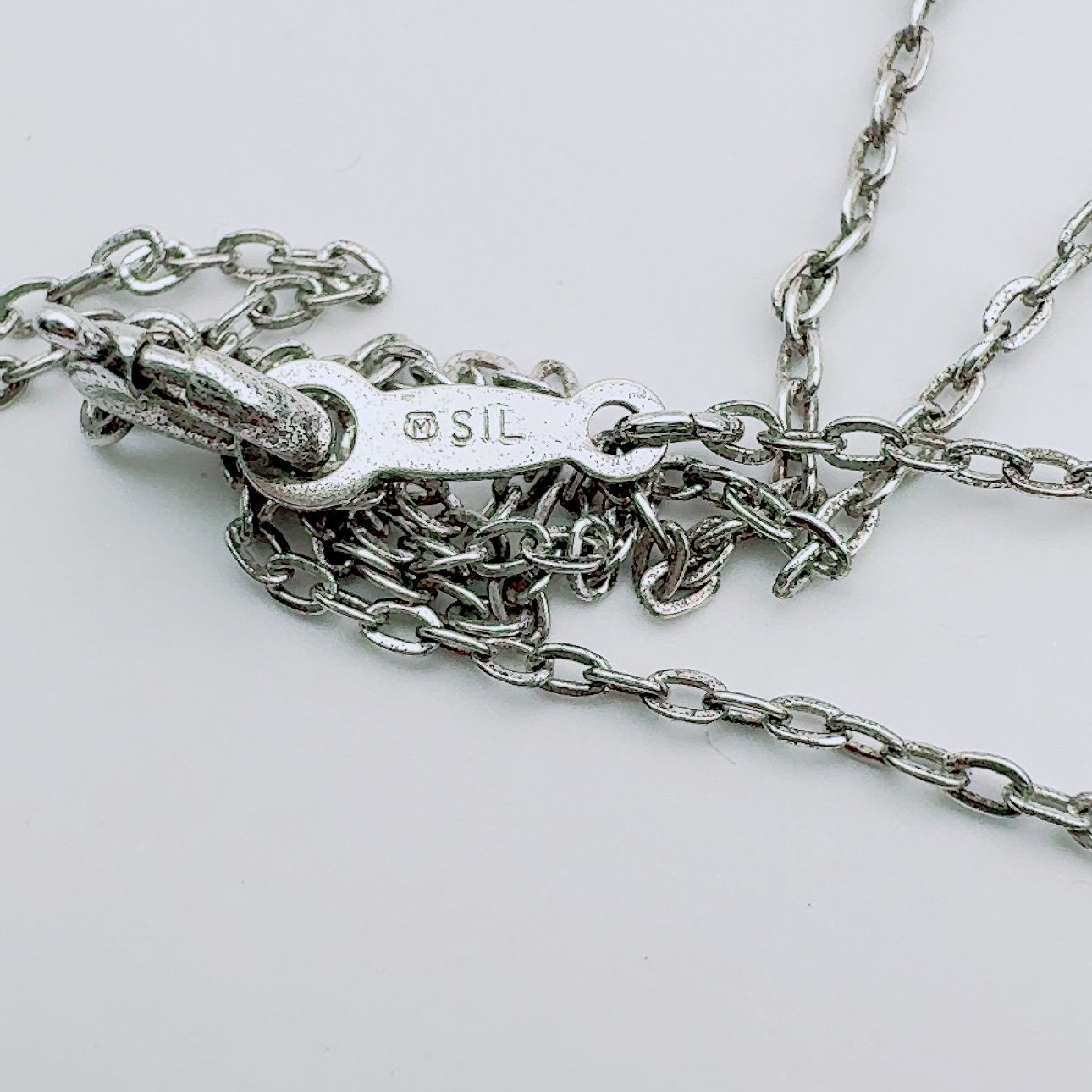 Mikimoto necklace with a 5.9mm pearl pendant on a 40cm silver chain