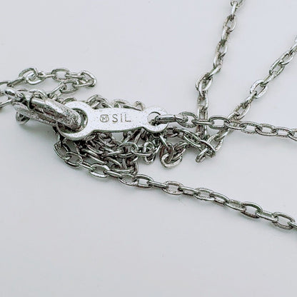 Mikimoto necklace with a 5.9mm pearl pendant on a 40cm silver chain