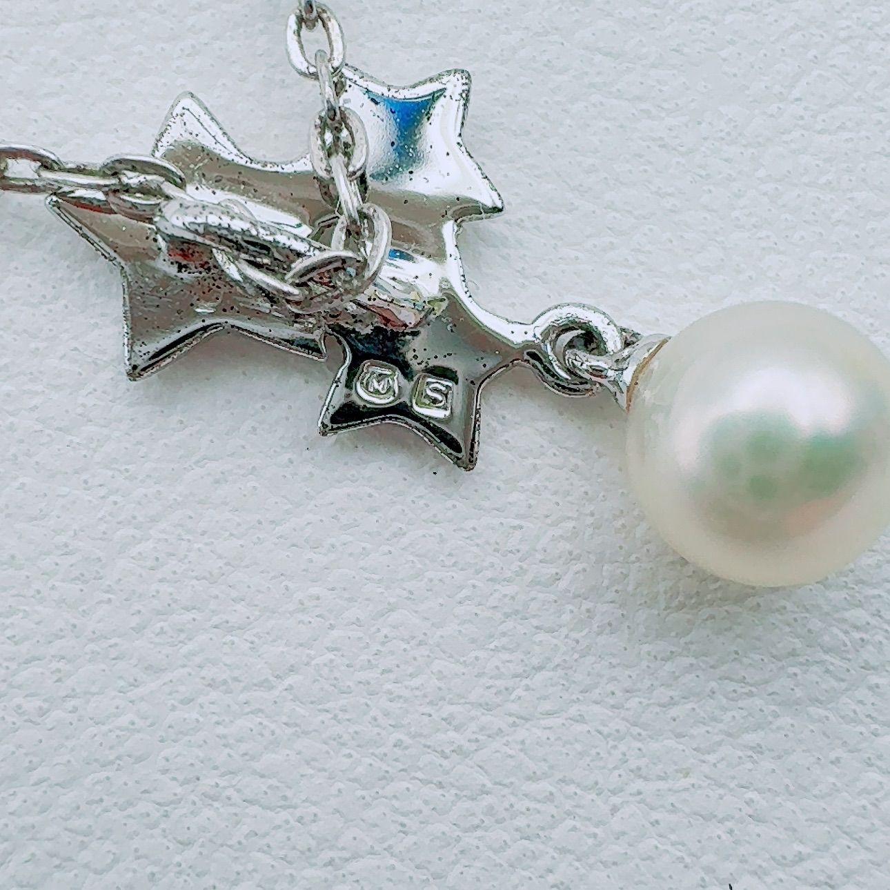 Mikimoto necklace with a 5.9mm pearl pendant on a 40cm silver chain
