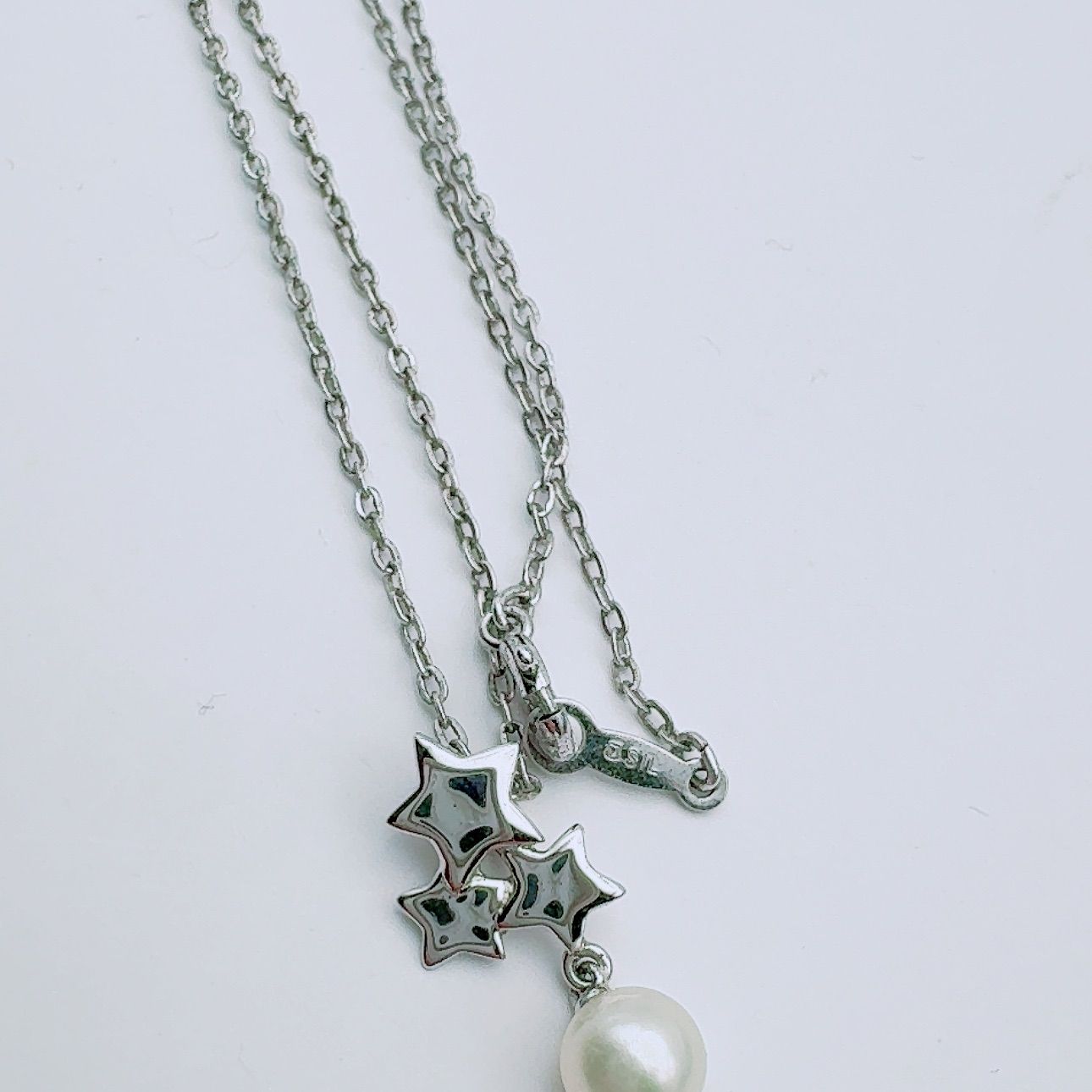 Mikimoto necklace with a 5.9mm pearl pendant on a 40cm silver chain