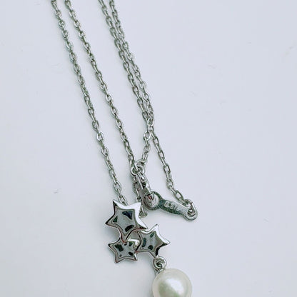 Mikimoto necklace with a 5.9mm pearl pendant on a 40cm silver chain