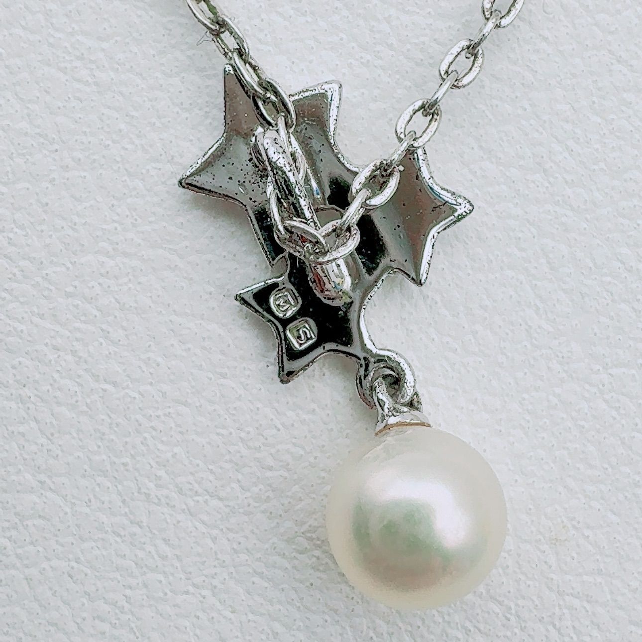 Mikimoto necklace with a 5.9mm pearl pendant on a 40cm silver chain