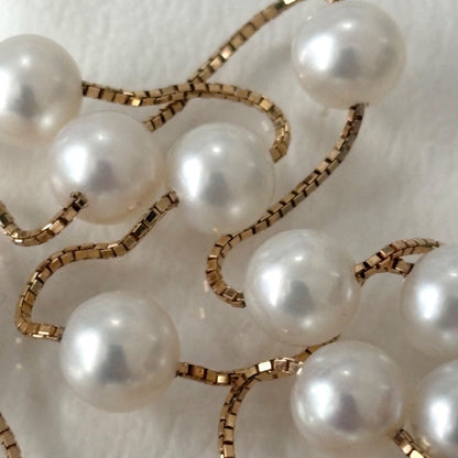 Tasaki K18 pearl necklace with 16 round beads, 44.5cm slide chain, pearls sized 6.5-7.0mm