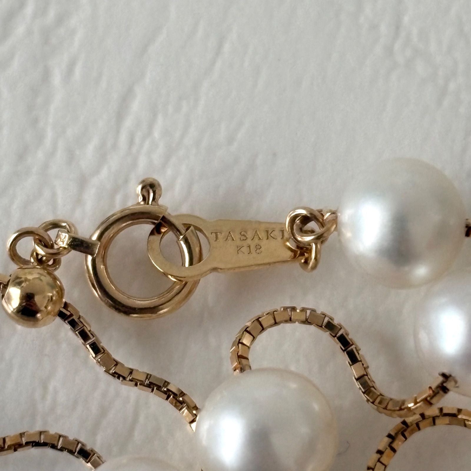 Tasaki K18 pearl necklace with 16 round beads, 44.5cm slide chain, pearls sized 6.5-7.0mm