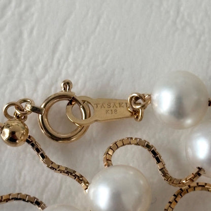 Tasaki K18 pearl necklace with 16 round beads, 44.5cm slide chain, pearls sized 6.5-7.0mm