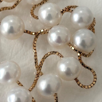 Tasaki K18 pearl necklace with 16 round beads, 44.5cm slide chain, pearls sized 6.5-7.0mm
