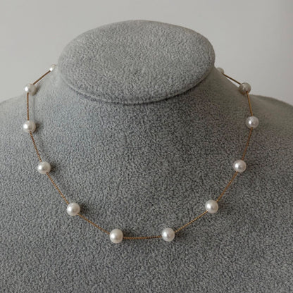 Tasaki K18 pearl necklace with 16 round beads, 44.5cm slide chain, pearls sized 6.5-7.0mm