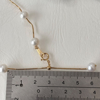 Tasaki K18 pearl necklace with 16 round beads, 44.5cm slide chain, pearls sized 6.5-7.0mm