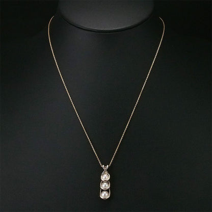 Tasaki K18 Sakura gold necklace featuring three pearls and a 46.8 cm chain with Sakura motif pendant