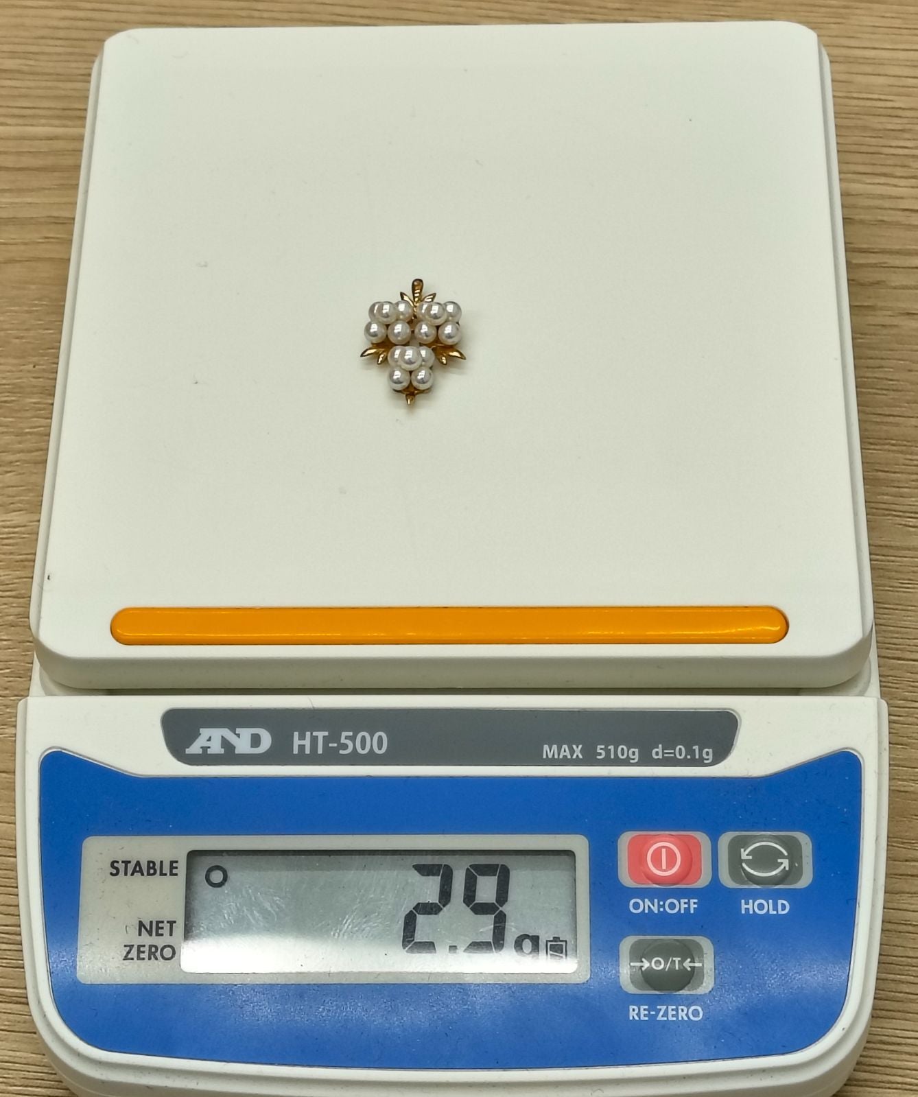 TASAKI Pearls grape motif pendant top in K14 yellow gold featuring a baby Akoya pearl