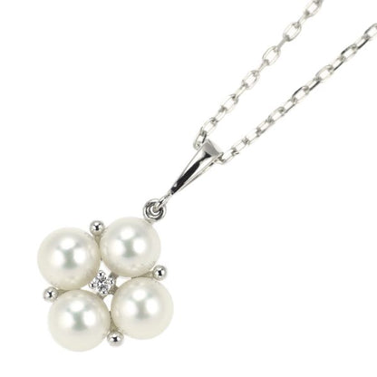 Mikimoto K18WG necklace featuring 4 Akoya pearls and a diamond pendant measuring 22mm by 13mm