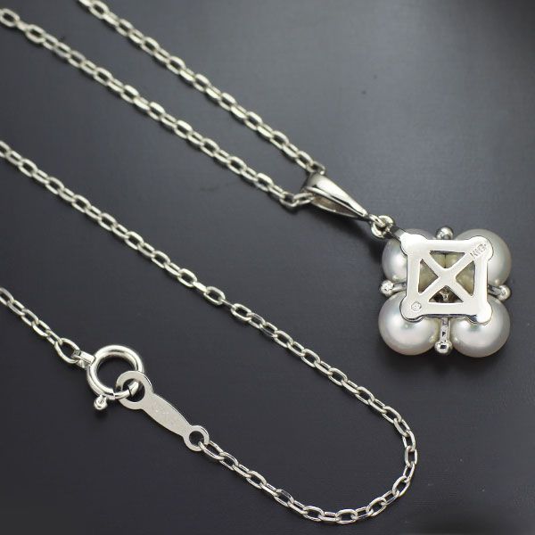 Mikimoto K18WG necklace featuring 4 Akoya pearls and a diamond pendant measuring 22mm by 13mm