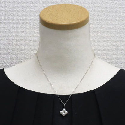Mikimoto K18WG necklace featuring 4 Akoya pearls and a diamond pendant measuring 22mm by 13mm