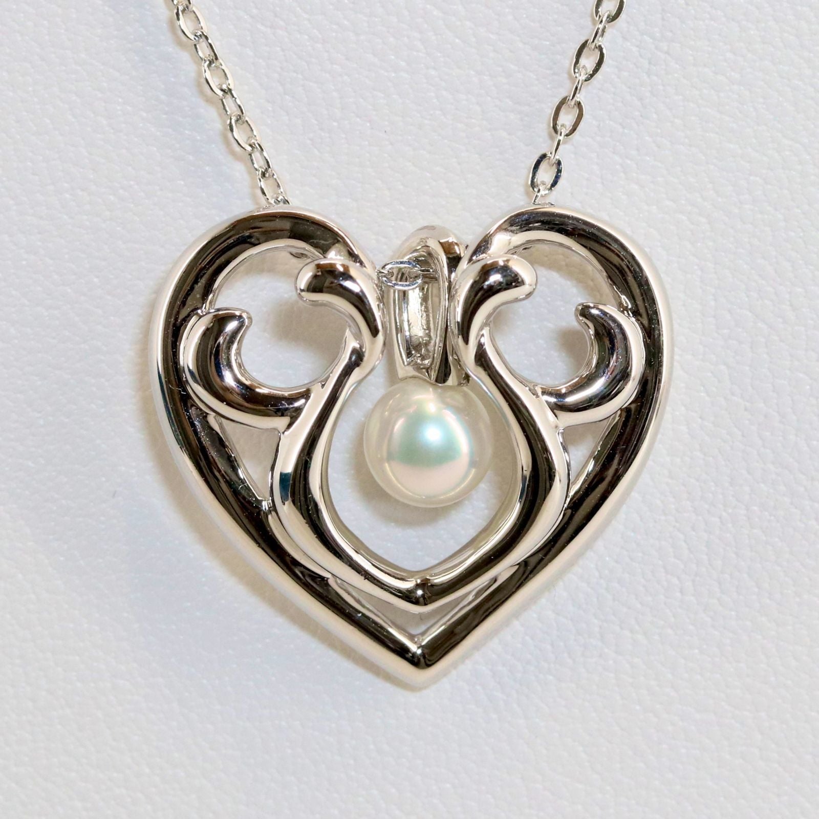 Micimoto silver necklace with a pearl heart pendant, showcasing a 3WAY design and delicate craftsmanship