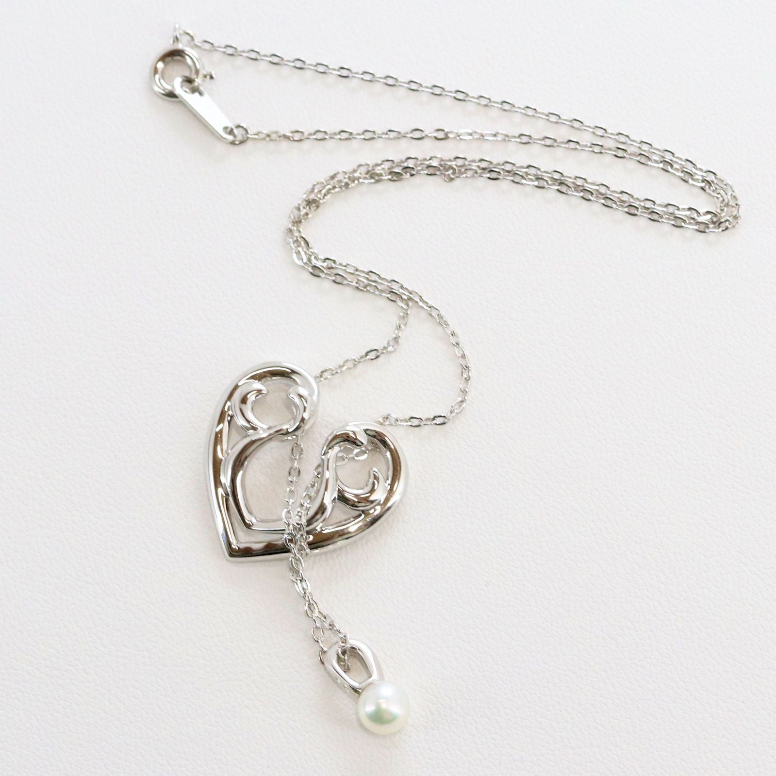 Micimoto silver necklace with a pearl heart pendant, showcasing a 3WAY design and delicate craftsmanship
