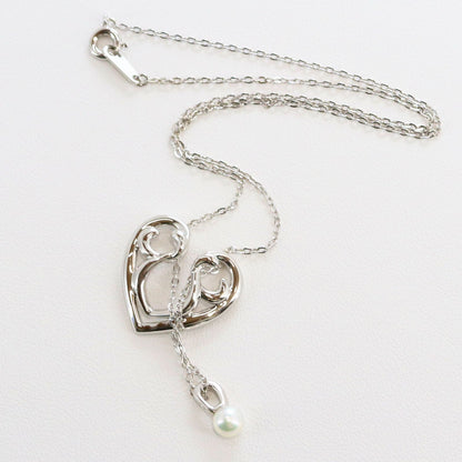 Micimoto silver necklace with a pearl heart pendant, showcasing a 3WAY design and delicate craftsmanship