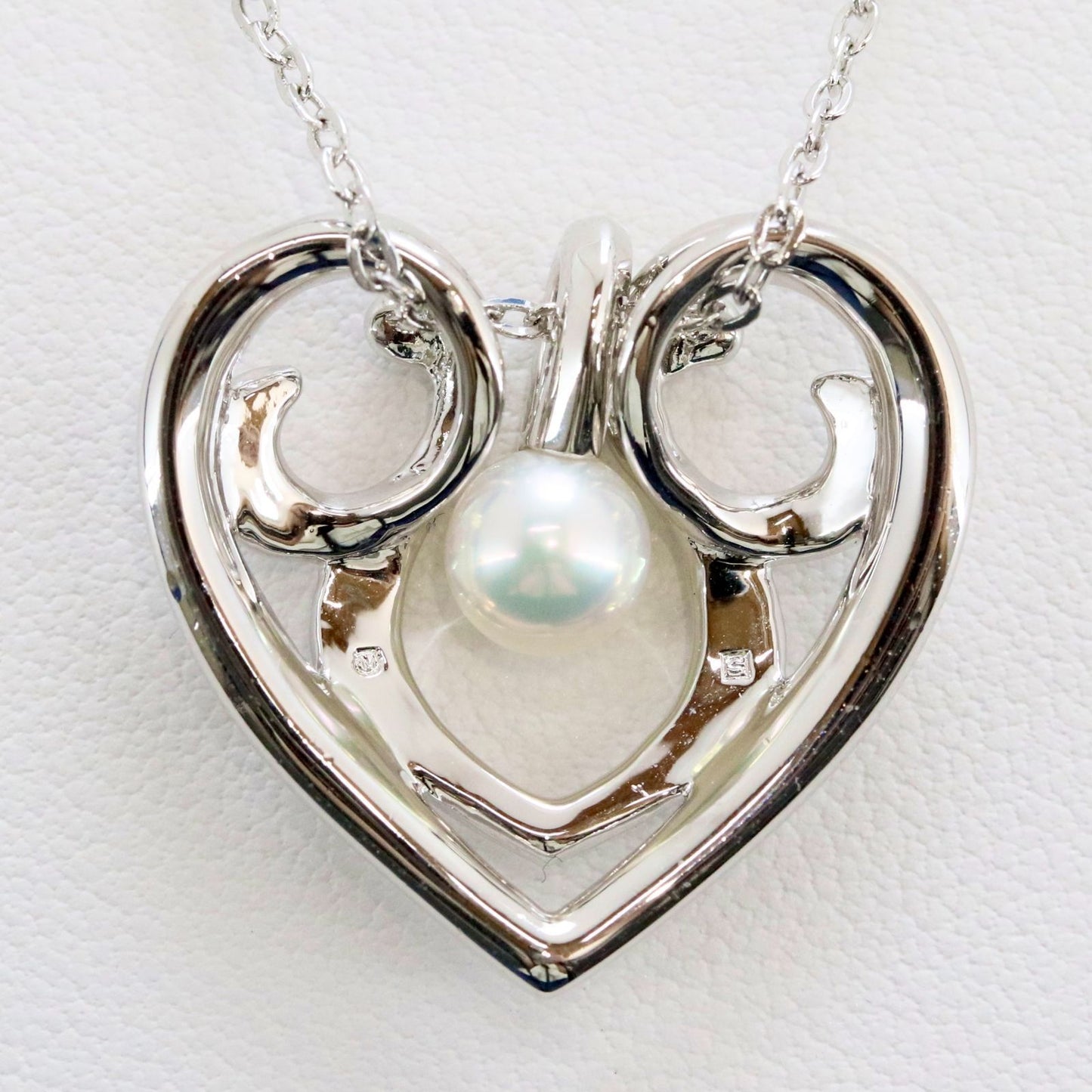 Micimoto silver necklace with a pearl heart pendant, showcasing a 3WAY design and delicate craftsmanship