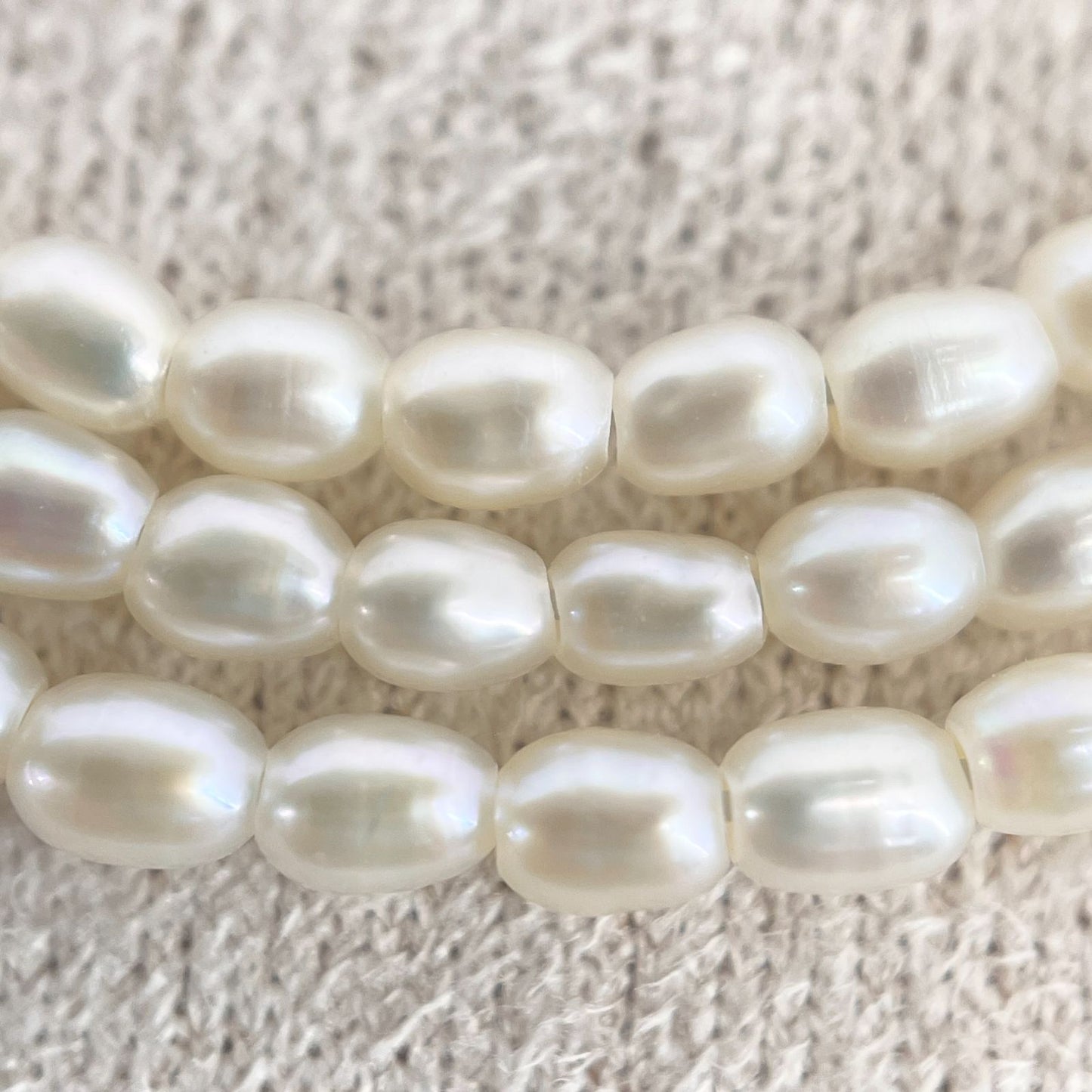 Mikimoto pearl necklace with small freshwater pearls set in K18WG white gold displayed on a white background