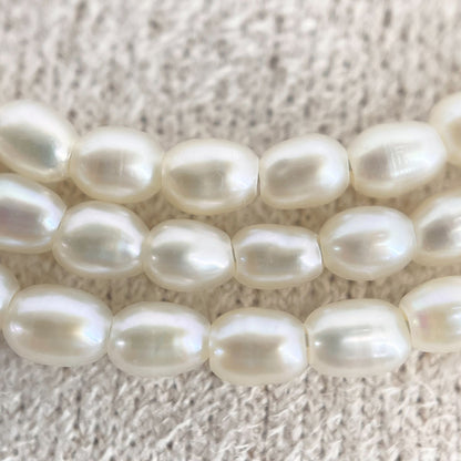 Mikimoto pearl necklace with small freshwater pearls set in K18WG white gold displayed on a white background